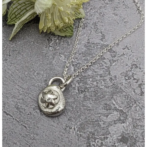 Small silver pendant rustic flower