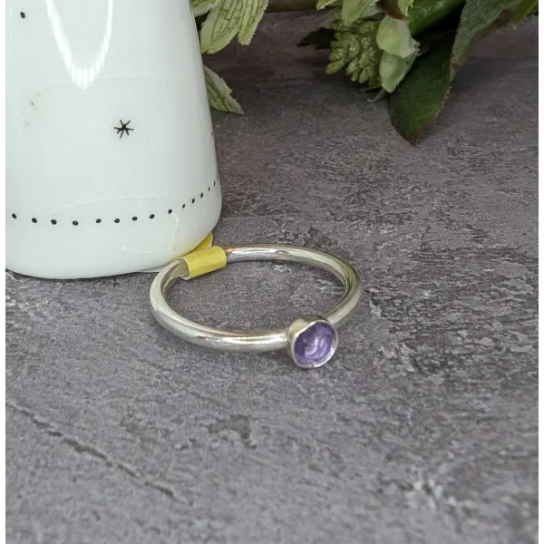 Sparkling purple gemstone ring