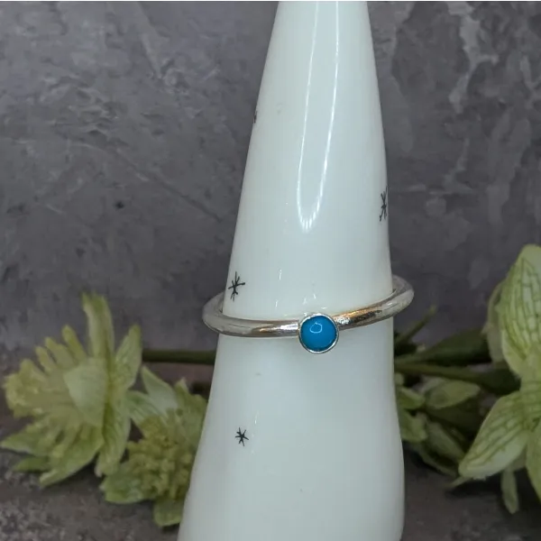 Sky blue stone in silver ring