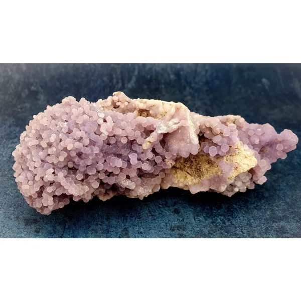 Natural purple grape agate crystal specimen with sparkling botryoidal grape-like clusters.